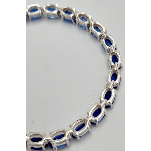 268 - A Kyanite Gemstone Tennis Bracelet set in 925 Silver. 18cm. 12g. CD-1371