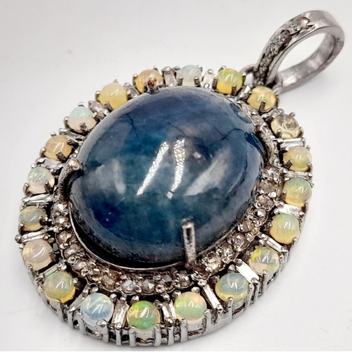 282 - A 22ct Cabochon Sapphire Pendant with a 1.50ctw Opal and 1.50ctw Diamond Surround - Set in 925 Silve... 