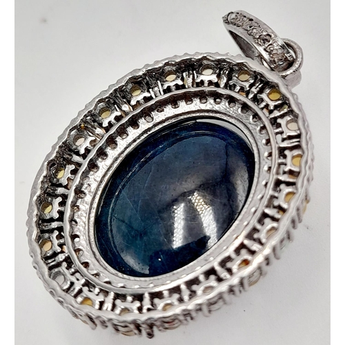 282 - A 22ct Cabochon Sapphire Pendant with a 1.50ctw Opal and 1.50ctw Diamond Surround - Set in 925 Silve... 