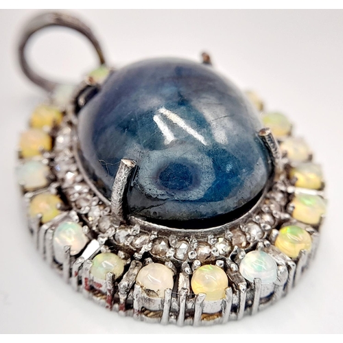 282 - A 22ct Cabochon Sapphire Pendant with a 1.50ctw Opal and 1.50ctw Diamond Surround - Set in 925 Silve... 