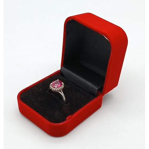 379 - A Ruby Gemstone Ring with Diamond Surround -0.30ctw set in 925 Silver. Size Q. Comes with a presenta... 