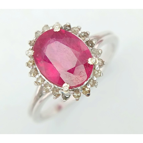 379 - A Ruby Gemstone Ring with Diamond Surround -0.30ctw set in 925 Silver. Size Q. Comes with a presenta... 