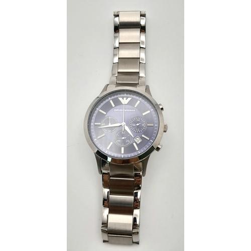 513 - An Emporio Armani Quartz Gents Watch. Stainless steel bracelet and case - 43mm. Blue dial with three... 