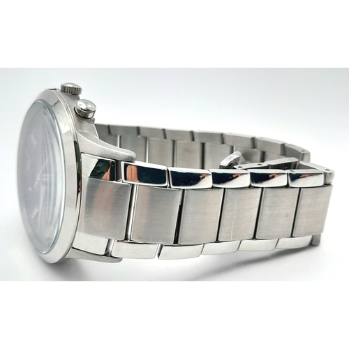 513 - An Emporio Armani Quartz Gents Watch. Stainless steel bracelet and case - 43mm. Blue dial with three... 