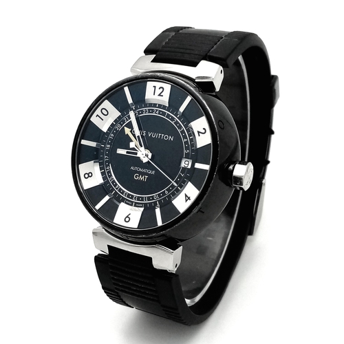 542 - A Stylish Louis Vuitton GMT Automatic Gents Watch. Black rubber strap. Black stainless steel case - ... 