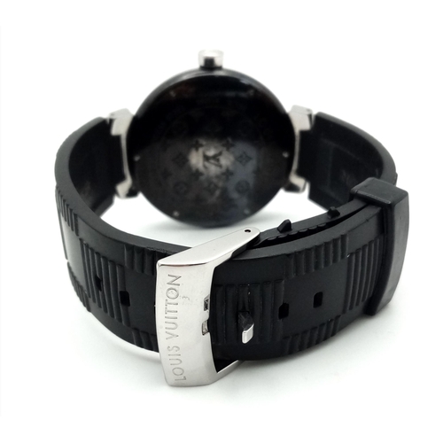 542 - A Stylish Louis Vuitton GMT Automatic Gents Watch. Black rubber strap. Black stainless steel case - ... 