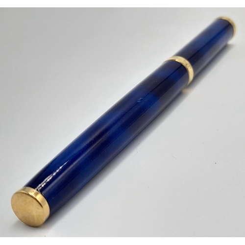 570 - A Watermans Decorative Blue Lacquer Pen with 18K Gold Nib. 13cm length.