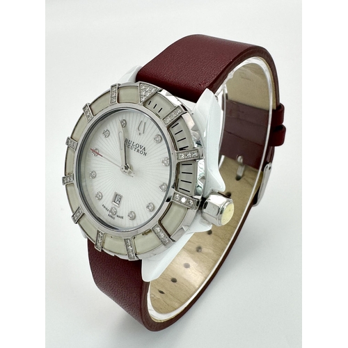 577 - A Bulova Accutron Diamond Ladies Watch. Red leather strap. Ceramic and steel case - 36mm. Diamond be... 