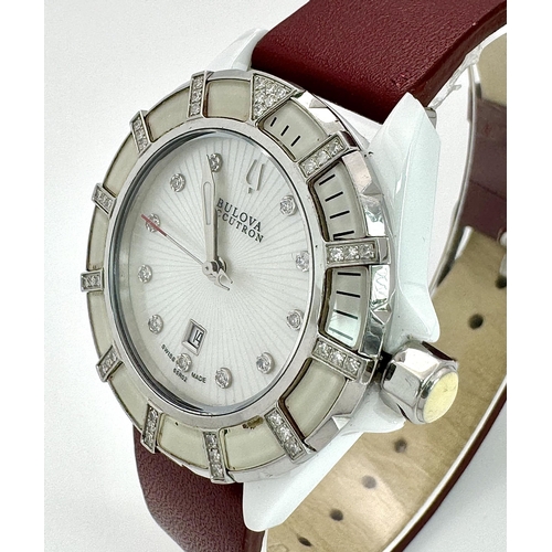 577 - A Bulova Accutron Diamond Ladies Watch. Red leather strap. Ceramic and steel case - 36mm. Diamond be... 