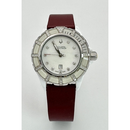 577 - A Bulova Accutron Diamond Ladies Watch. Red leather strap. Ceramic and steel case - 36mm. Diamond be... 