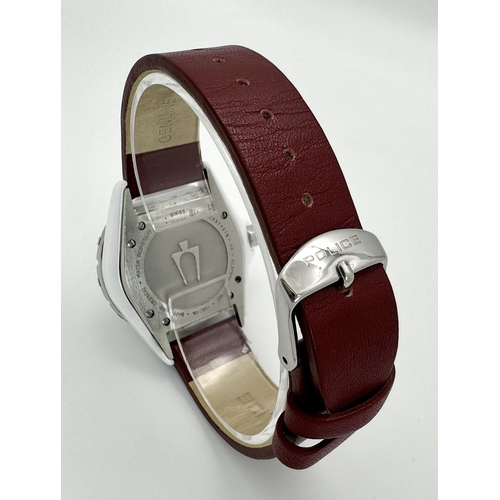 577 - A Bulova Accutron Diamond Ladies Watch. Red leather strap. Ceramic and steel case - 36mm. Diamond be... 