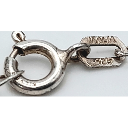 1700 - AN ANTIQUE SILVER VINIGARETTE ON A 50cms SILVER CHAIN . 7.2gms