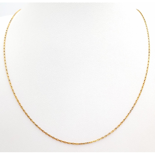 727 - A VINTAGE 14K GOLD NECK CHAIN .    2.8gms   52cms