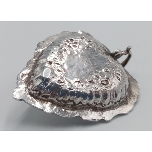 1701 - A Sterling Silver Miniature Candle Holder. London hallmarks, 
5cm. 11.5g