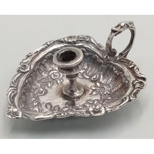 1701 - A Sterling Silver Miniature Candle Holder. London hallmarks, 
5cm. 11.5g