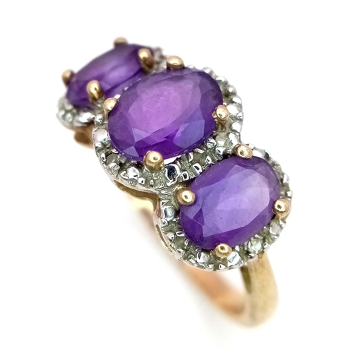 119 - Stunning 9 carat GOLD ,AMETHYST and DIAMOND RING. Having three large oval cut AMETHYSTS with DIAMOND... 