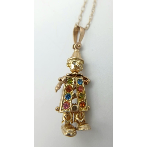 147 - 9 carat GOLD CLOWN PENDANT, Having coloured jewel detail with movable parts. Fully hallmarked and mo... 