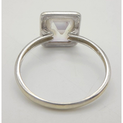 154 - Stunning 9 carat WHITE GOLD, AMETHYST and DIAMOND RING. Consisting an Emerald Cut ‘Rose De France’ A... 