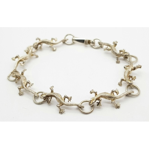 161 - Fully hallmarked SILVER SALAMANDER BRACELET. Beautiful condition. 20 cm.