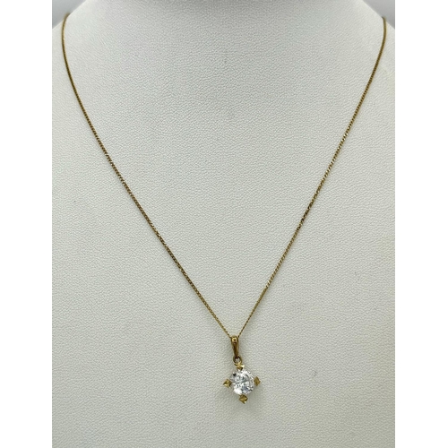 182 - Sparkling 9 CARAT GOLD & ZIRCONIA PENDANT mounted on a fine 9 CARAT GOLD CHAIN. Complete with jewell... 