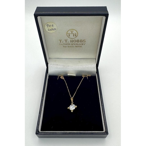 182 - Sparkling 9 CARAT GOLD & ZIRCONIA PENDANT mounted on a fine 9 CARAT GOLD CHAIN. Complete with jewell... 