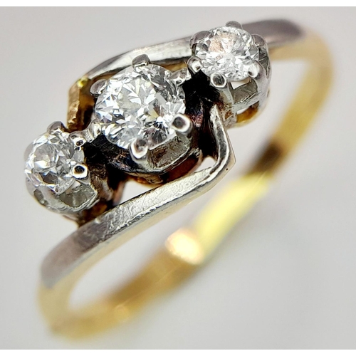 193 - A 18K YELLOW GOLD & PLATINUM VINTAGE OLD CUT DIAMOND 3 STONE RING. 0.25CT. 2.96G IN WEIGHT. SIZE L. ... 