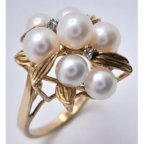 200 - A 9K YELLOW GOLD PEARL & DIAMOND CLUSTER RING - 4.6G. SIZE M.