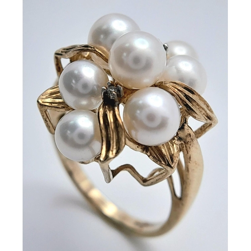 200 - A 9K YELLOW GOLD PEARL & DIAMOND CLUSTER RING - 4.6G. SIZE M.