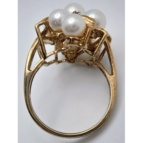 200 - A 9K YELLOW GOLD PEARL & DIAMOND CLUSTER RING - 4.6G. SIZE M.