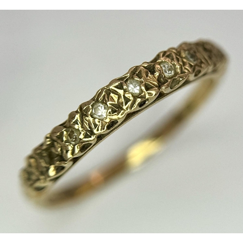 210 - 9 carat GOLD and DIAMOND RING. Having a row of 9 DIAMONDS Pave Set to top. Fully hallmarked and comp... 