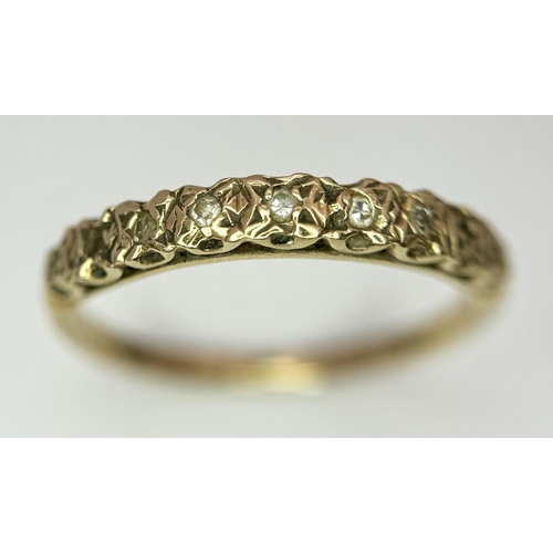 210 - 9 carat GOLD and DIAMOND RING. Having a row of 9 DIAMONDS Pave Set to top. Fully hallmarked and comp... 