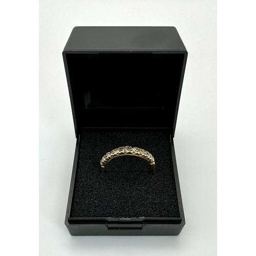 210 - 9 carat GOLD and DIAMOND RING. Having a row of 9 DIAMONDS Pave Set to top. Fully hallmarked and comp... 