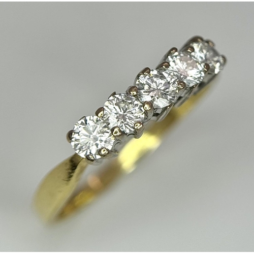 214 - AN 18K YELLOW GOLD DIAMOND 3 STONE RING - 0.50CT. 3.8G. SIZE L. REF: PERS 5002