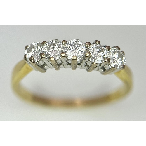 214 - AN 18K YELLOW GOLD DIAMOND 3 STONE RING - 0.50CT. 3.8G. SIZE L. REF: PERS 5002