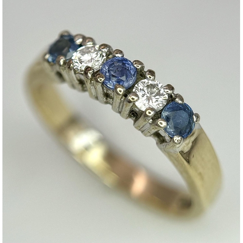 221 - A 9K YELLOW GOLD DIAMOND & SAPPHIRE RING - 2.8G. SIZE L. REF: A/S 1093