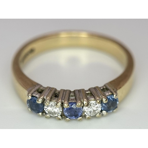 221 - A 9K YELLOW GOLD DIAMOND & SAPPHIRE RING - 2.8G. SIZE L. REF: A/S 1093