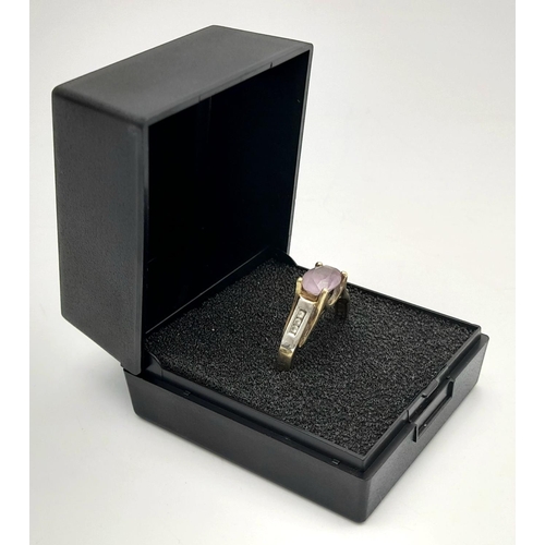 224 - Stunning  Hallmarked  9 carat GOLD, AMETHYST and DIAMOND RING. Consisting an Oval Cut Pale AMETHYST ... 