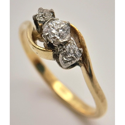 235 - AN 18K YELLOW GOLD ( TESTED ) VINTAGE OLD CUT DIAMOND 3 STONE TWIST RING - 0.25CT. 2.2G. SIZE K. REF... 