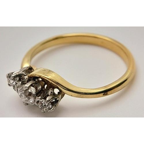 235 - AN 18K YELLOW GOLD ( TESTED ) VINTAGE OLD CUT DIAMOND 3 STONE TWIST RING - 0.25CT. 2.2G. SIZE K. REF... 