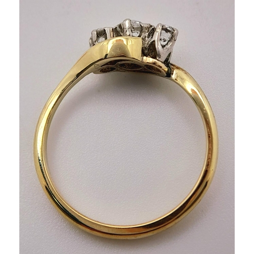 235 - AN 18K YELLOW GOLD ( TESTED ) VINTAGE OLD CUT DIAMOND 3 STONE TWIST RING - 0.25CT. 2.2G. SIZE K. REF... 