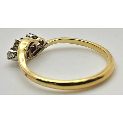 235 - AN 18K YELLOW GOLD ( TESTED ) VINTAGE OLD CUT DIAMOND 3 STONE TWIST RING - 0.25CT. 2.2G. SIZE K. REF... 