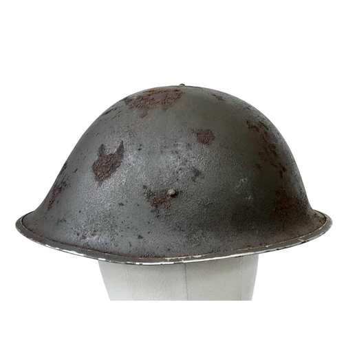 248 - WW2 British 44 Pattern “Turtle” D-Day Helmet and liner, with insignia of the Royal Artillery.