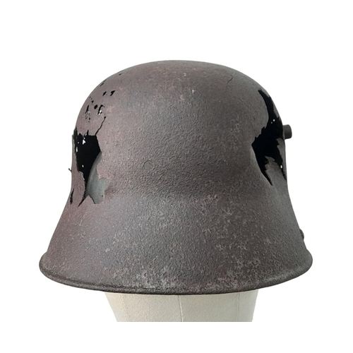 258 - WW1 Imperial German Battle Damaged M16 Stahlhelm Helmet that was found Cambrai, France, where the fi... 