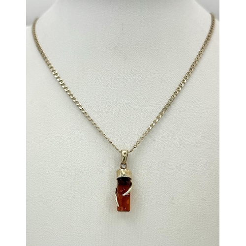 273 - Interesting and unusual AMBER and SILVER PENDANT Mounted on a fancy link SILVER CHAIN NECKLACE. Pres... 