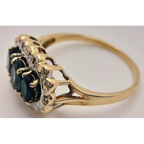 278 - A 9K YELLOW GOLD DIAMOND & TEAL SAPPHIRE RING. 2.9G IN WEIGHT. SIZE R. Ref: SC 5003.