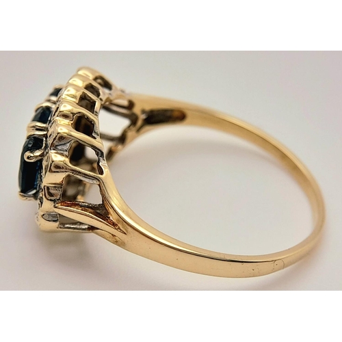 278 - A 9K YELLOW GOLD DIAMOND & TEAL SAPPHIRE RING. 2.9G IN WEIGHT. SIZE R. Ref: SC 5003.