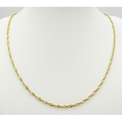 287 - Pretty and attractive Fully hallmarked 9 carat GOLD TWIST LINK NECKLACE. 3.2 grams. 45 cm.