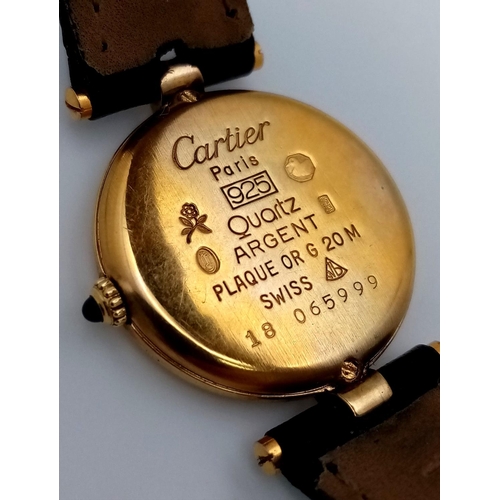 30 - A Must de Cartier Gold Plated 925 Silver Ladies Quartz Watch. Black leather strap. Gold plated circu... 