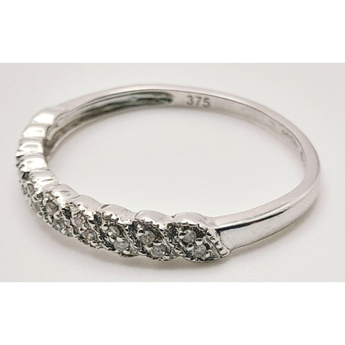 306 - A 9K WHITE GOLD DIAMOND BAND RING. 0.10CT. 1.3G TOTAL WEIGHT. SIZE P. Ref: SC 5010