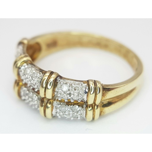 334 - A 9K YELLOW GOLD DIAMOND SET BAMBOO LOOK RING. 2.7G IN WEIGHT. SIZE P. Ref: SC 5054